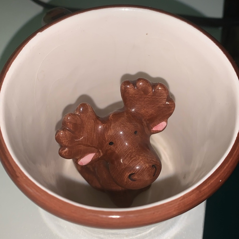 Vintage mug with moose inside and out